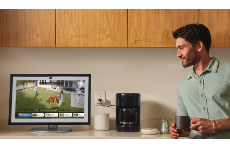 Man watching a video while having coffee.