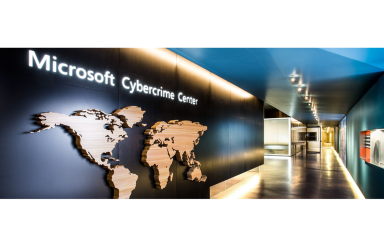 A hallway with Microsoft Cybercrime Center sign on the wall.